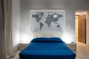 מיטה או מיטות בחדר ב-Artistico Relax B&B