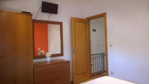 Postel nebo postele na pokoji v ubytování Casa das Neves