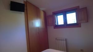 TV a/nebo společenská místnost v ubytování Casa das Neves