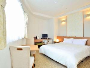 Voodi või voodid majutusasutuse Bay Resort Hotel Shodoshima toas