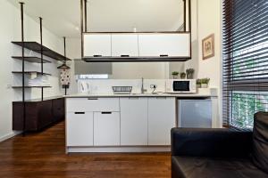 Kuchyň nebo kuchyňský kout v ubytování Hanasi 129 - Boutique Apartments