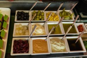 a display of different types of fruits and vegetables at Golden Temple Villa in Siem Reap