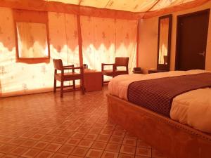 Postel nebo postele na pokoji v ubytování Sultan Resort