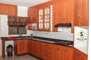 A kitchen or kitchenette at Streets of Gold Guest House