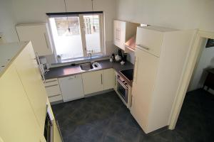 Cuina o zona de cuina de Vakantiewoning Afterdaan 6 fotos més