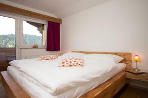 Łóżko lub łóżka w pokoju w obiekcie Apartmenthaus Lieselotte