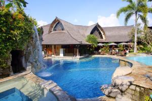Πισίνα στο ή κοντά στο Hotel Vila Lumbung