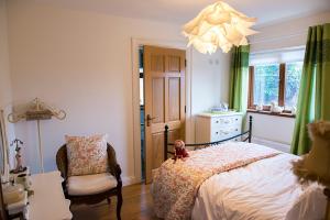 Postel nebo postele na pokoji v ubytování Cherrytree House B&B