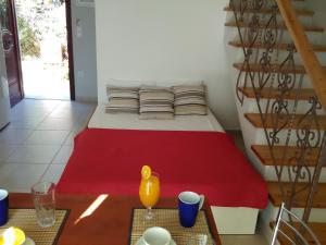 Postel nebo postele na pokoji v ubytování Mikros Gialos Apartments