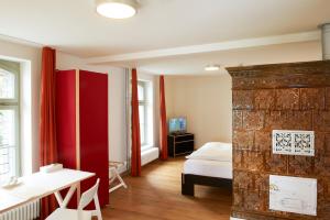 Letto o letti in una camera di Boutique-Hotel Auberge Langenthal