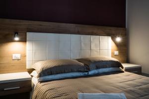 A bed or beds in a room at New Gallery