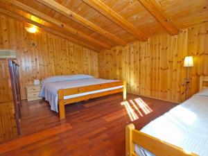Postel nebo postele na pokoji v ubytování Apartment Mitar 1271