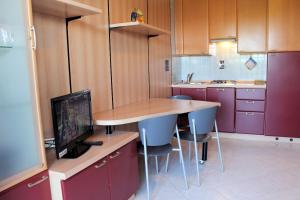 Ett kök eller pentry på Appartamenti Grado