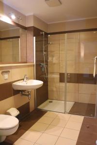 Kúpeľňa v ubytovaní Apartamenty Olympic Park