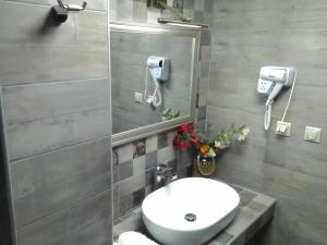Koupelna v ubytování Mikros Gialos Apartments