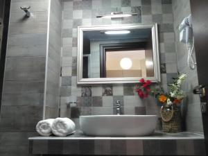 Koupelna v ubytování Mikros Gialos Apartments