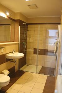 Kúpeľňa v ubytovaní Apartamenty Olympic Park + 22 fotografií