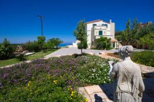A garden outside Golden Key Villas