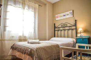 Posteľ alebo postele v izbe v ubytovaní Recreo San Andrés