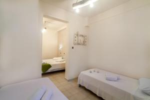 Letto o letti in una camera di Amaryllis Hotel