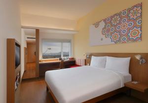 ibis Pune Hinjewadi - An Accor Brand客房内的一张或多张床位