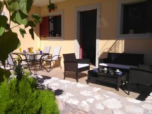 Posezení v ubytování Mikros Gialos Apartments