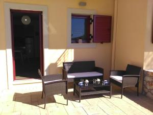 Posezení v ubytování Mikros Gialos Apartments