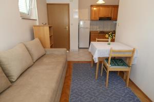 Kuchyň nebo kuchyňský kout v ubytování Apartments Nada