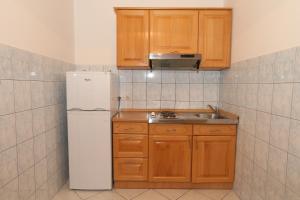 Kuchyň nebo kuchyňský kout v ubytování Apartments Nada