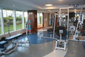 O centro de fitness e/ou as comodidades de fitness de Apartamento na praia de Armação