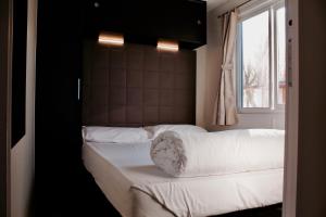 Posteľ alebo postele v izbe v ubytovaní Camping Venezia Village