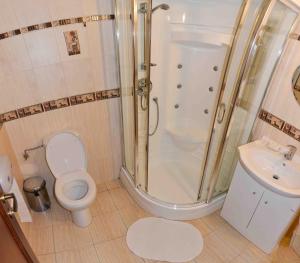 Kúpeľňa v ubytovaní Garni Hotel Tatramonti