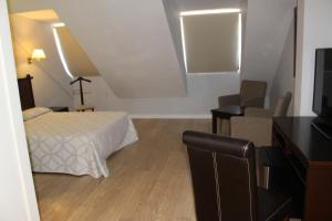 Kép Apartahotel Villa de Parla szállásáról Parlában a galériában Még 22 kép