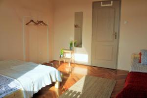Postel nebo postele na pokoji v ubytování Lidi Guesthouse
