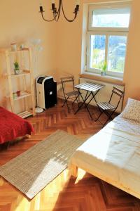 Postel nebo postele na pokoji v ubytování Lidi Guesthouse