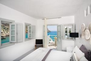Cama ou camas em um quarto em Blue Sand Boutique Hotel & Suites