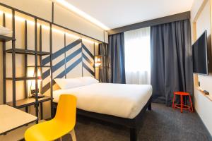Ліжко або ліжка в номері ibis Styles Geneve Palexpo Aeroport