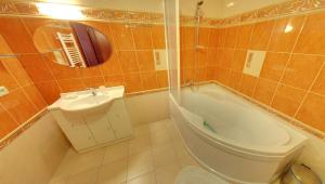 Kúpeľňa v ubytovaní Garni Hotel Tatramonti