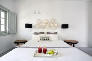 Cama ou camas em um quarto em Blue Sand Boutique Hotel & Suites