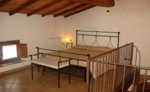 Postel nebo postele na pokoji v ubytování Residence Buca di Bacco