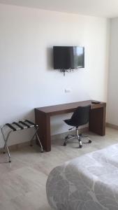 TV a/nebo společenská místnost v ubytování Aquamarina Hotel