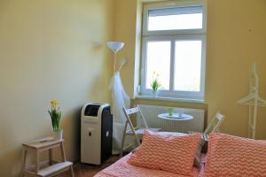 Postel nebo postele na pokoji v ubytování Lidi Guesthouse