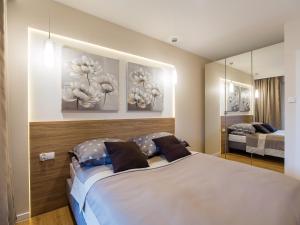 Postel nebo postele na pokoji v ubytování Apartament A106 Polanki Park SPA + 56 fotografií