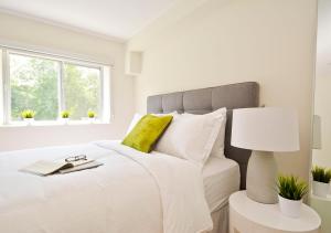 Un ou plusieurs lits dans un hébergement de l'établissement LIV Extended Stay