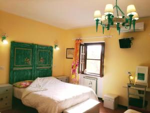 Postel nebo postele na pokoji v ubytování Agriturismo L.B.STUD