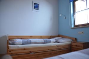 Llit o llits en una habitació de Haus Gaby Stöckl
