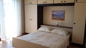 Posteľ alebo postele v izbe v ubytovaní Apartman Anka