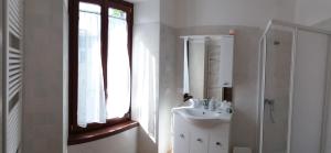 Ванна кімната в Carlito's Trattoria con alloggio