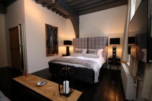 Katil atau katil-katil dalam bilik di Boutique Hotel Steenhof Suites - Adults Only