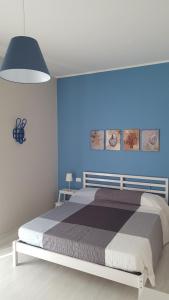 Krevet ili kreveti u jedinici u okviru objekta Galù Guest House Gaeta